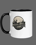 White mug with black handle featuring 'Knuckleball Shop' logo on a gray background