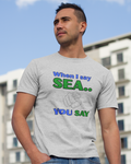 Man wearing a gray t-shirt with WHEN I SAY SEA design