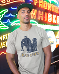 Man wearing a t-shirt with 'Day Ones'  in front of neon signs