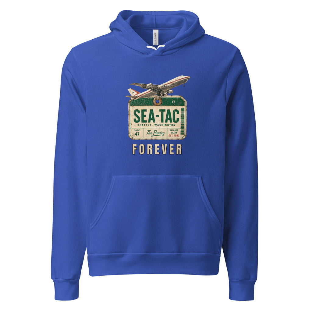 A royal blue pullover hoodie with a vintage-style 'Sea-Tac Forever' graphic on the chest, featuring an airplane and a retro airport sign, shown against a plain white background.