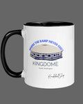 White mug with black inside and black handle featuring  the Kingdome with signature